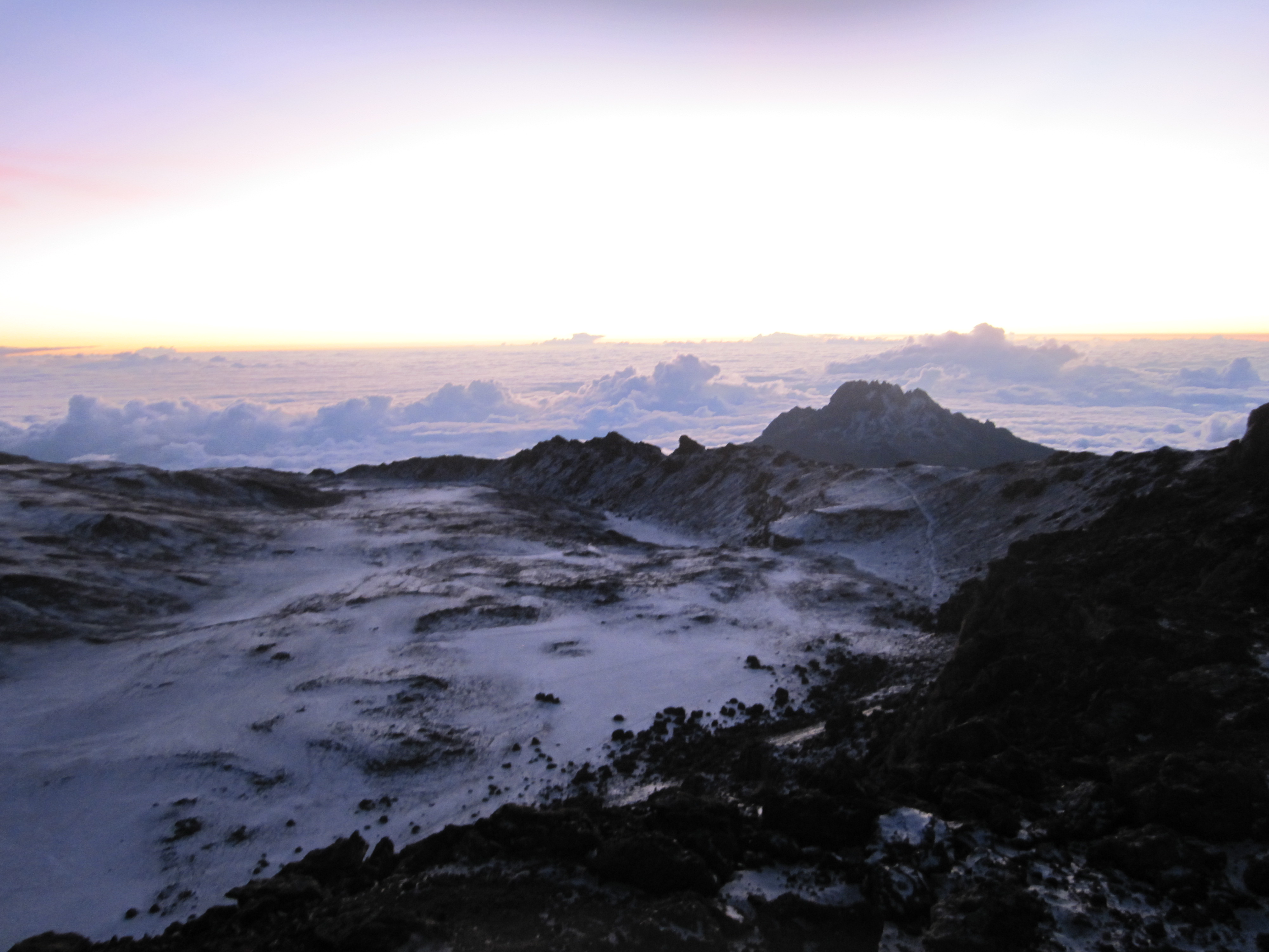 View of Mawenzi behind the crater at the center of Kibo